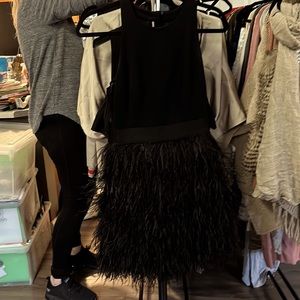 Black Milly dress with with feather bottom